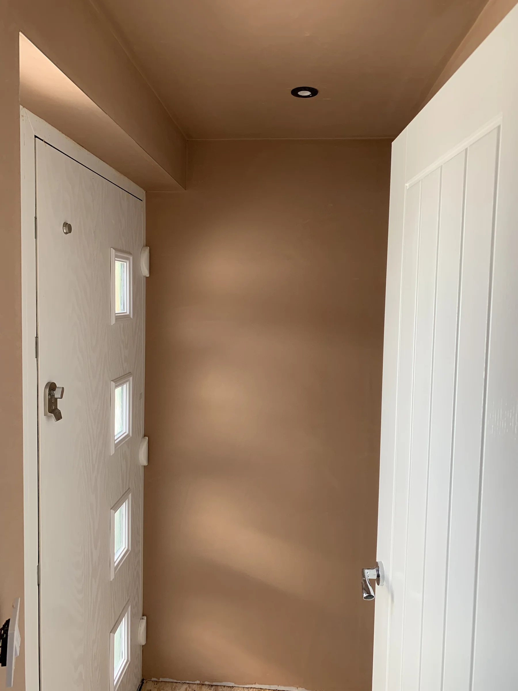 Freshly plastered hallway walls and ceiling by Nick's Home Improvements